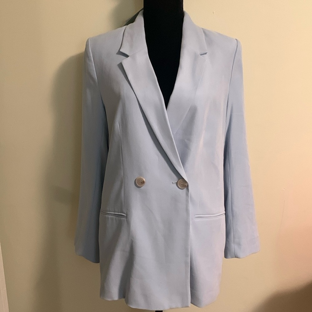 H&M light blue fitted blazer. One button at front. Lined.